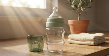wide neck baby bottle, best nipple for latching breast to bottle, anti colic, and attached cap